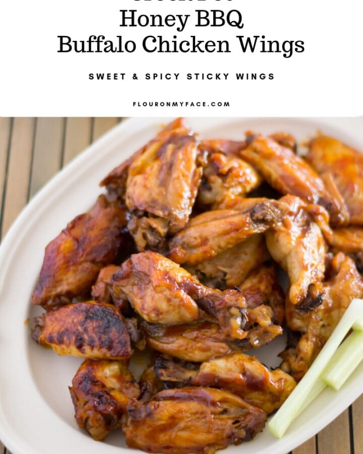 Crock Pot Honey BBQ Buffalo Chicken Wings recipe served on a platter with homemade ranch dressing.
