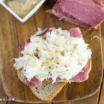 Corned Beef sandwich with sauerkraut via flouronmyface.com