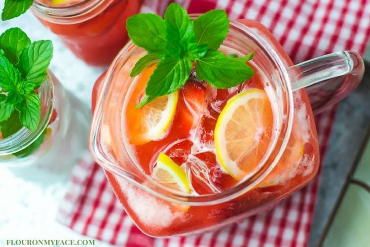 Ice cold pitcher of sweet Strawberry Lemonade