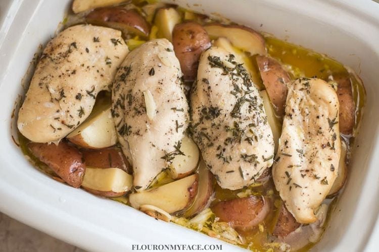 Slow cooker garlic herb chicken is a great summer crock pot recipe.