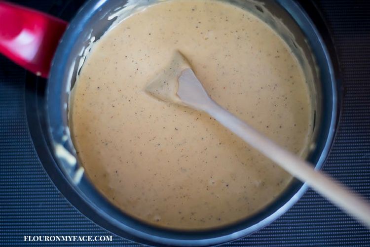 Homemade cheese sauce for cauliflower mac and cheese recipe.