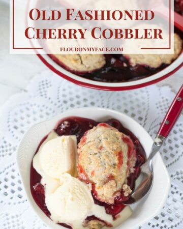 Old Fashioned Cherry Cobbler recipe just like Grandma made served in an enamel pan topped with homemade biscuit topping