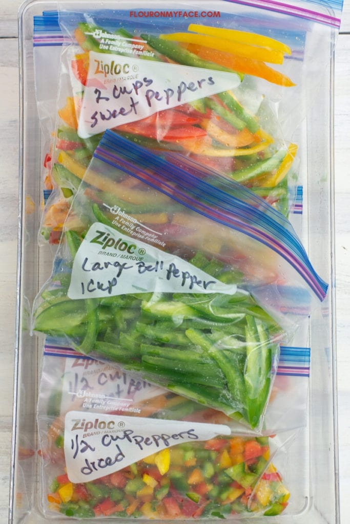 multiply ziplock quart freezer bags filled with sliced and diced bell peppers before freezing them to use later