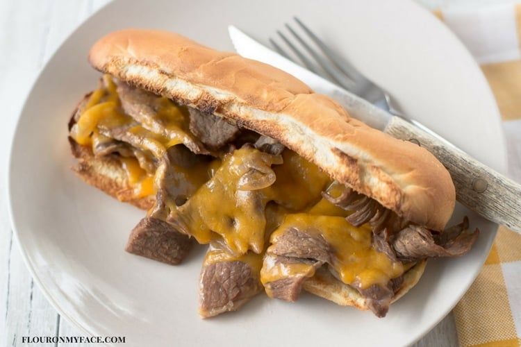 Easy Crock Pot Slow Cooker French Dip Sandwich recipe via flouronmyface.com