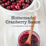 Homemade Cranberry Sauce recipe in a canning jar with a colander full of fresh cranberries