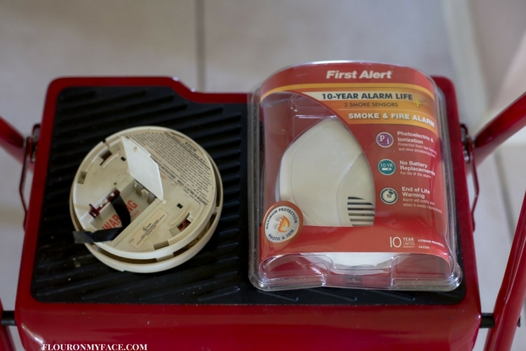 Replacing an old smoke alarm with a new 10 year battery life First Alert smoke and fire alarm.