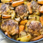 Greek Style Roasted Chicken with potatoes served in a skillet