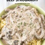 Creamy Crock Pot Beef Stroganoff served over egg noodles