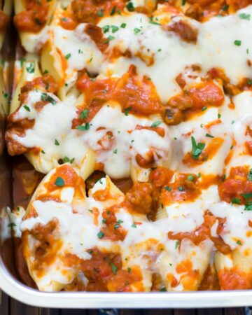 Bakes Butternut Squash and Sausage Stuffed Shells in a lasagna pan.