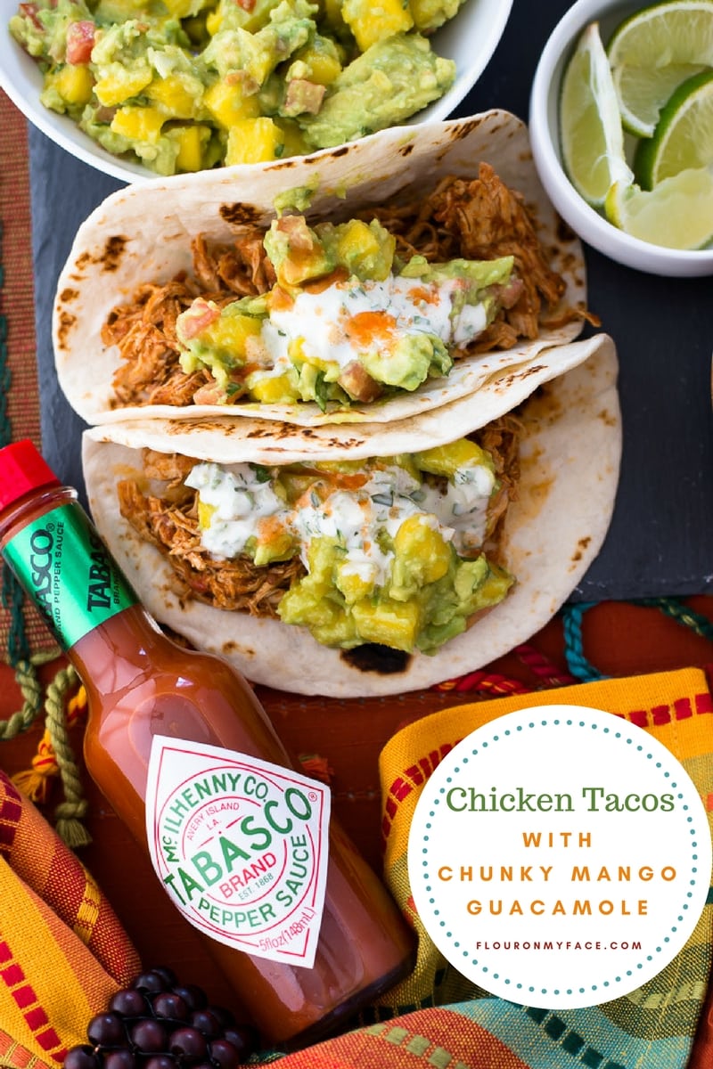 Easy Instant Pot Chicken Tacos with homemade Chunky Mango Guacamole topped with Spicy Jalapeno Sauce and TABASCO sauce