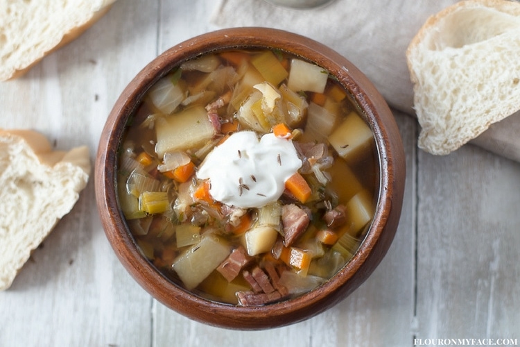 Ham Cabbage Potato and Fennel Soup recipe served in a wooden bowl.