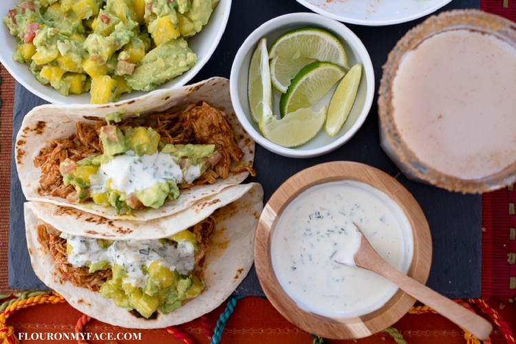 Creamy Jalapeno Sauce served with Instant Pot Chicken Tacos and Mango Guacamole