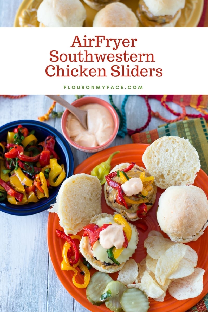 Game Day food on the table with Southwestern Chicken Sliders, airfryer bell peppers, Sriracha mayonnaise on a orange Fiesta-ware plate. 
