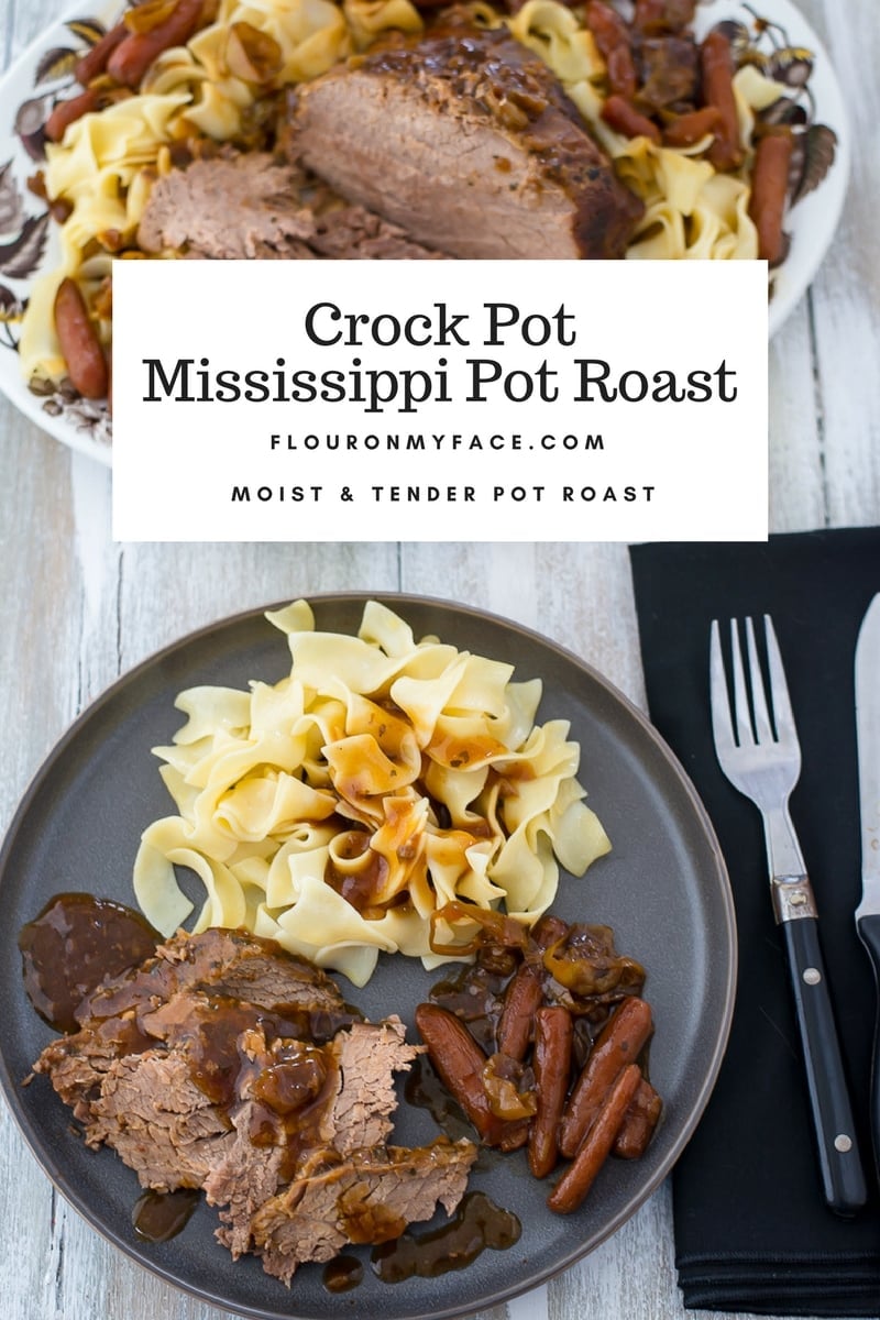Tender and moist Crock Pot Mississippi Pot Roast on a grey dinner plate served with noodles and gravy.