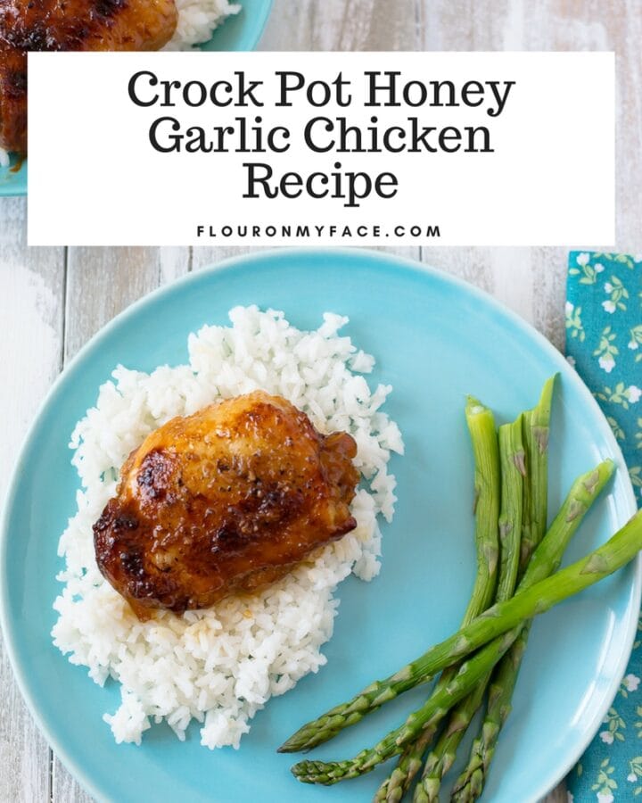 Easy Crock Pot Honey Garlic Chicken Thigh recipe served on white rice.