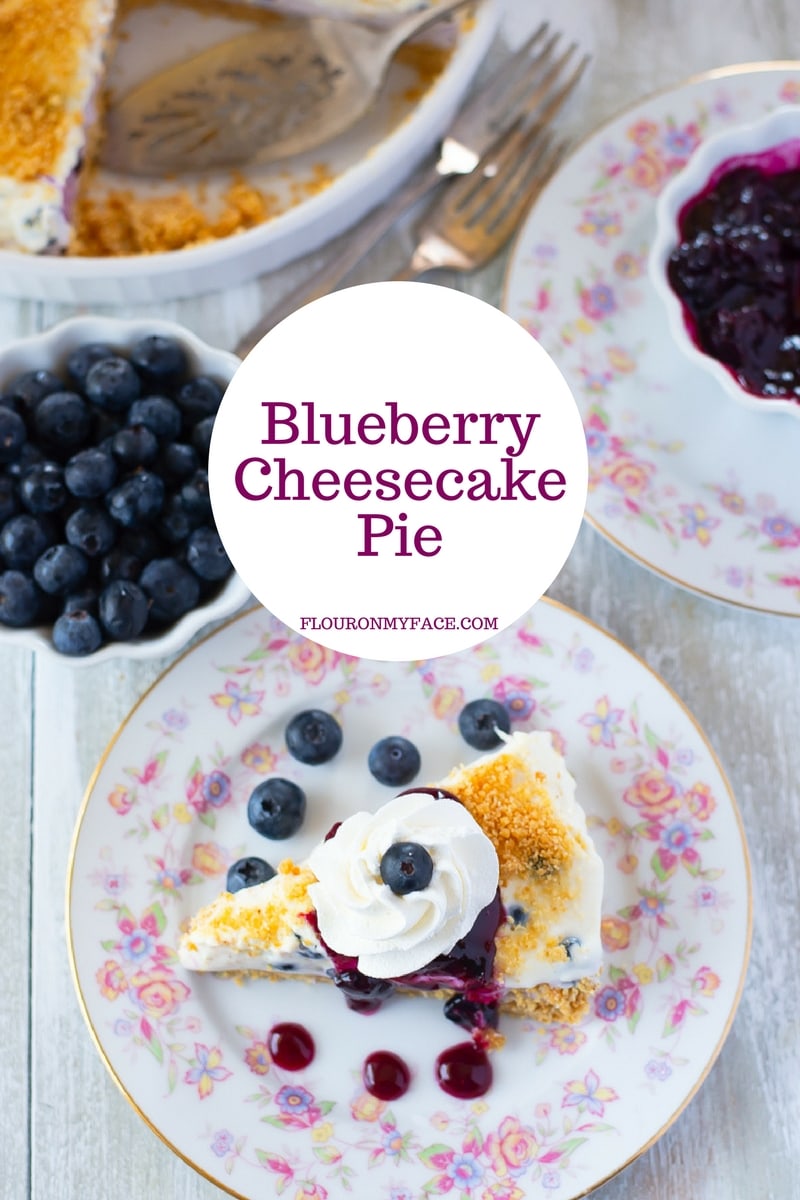 Blueberry Cheesecake Pie recipe made with 2 layers of blueberry flavored cheesecake and topped with homemade blueberry sauce.