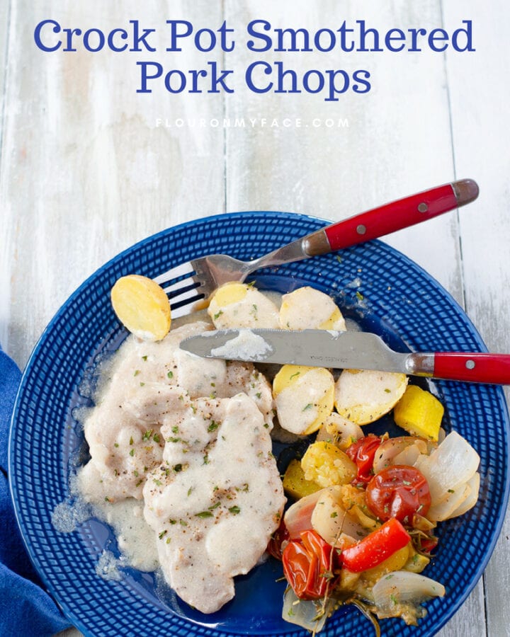 Crock Pot Smothered Pork CHops served with golden baby potatoes and a simple Sauteed Summer Vegetables side dish.