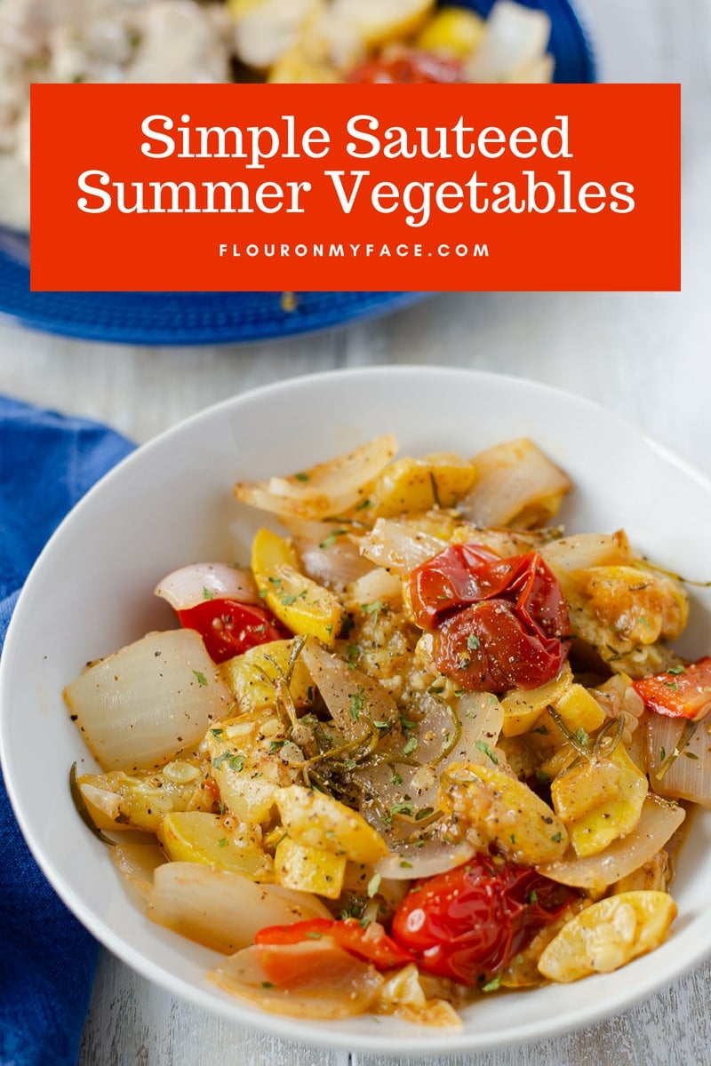 A white serving bowl with simple sauteed summer vegetables recipe.