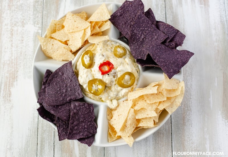 Slow Cooker Jalapeno Popper Dip recipe served with tortilla chips.