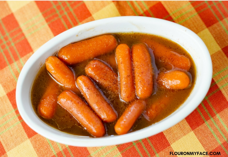 Sweet Crock Pot Glazed Carrots recipe served in a individual serving dish