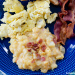 Crock Pot Cheesy Hash Brown Potatoes recipe for breakfast with eggs and bacon.