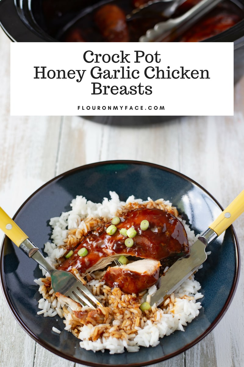 Crock Pot Honey Garlic Chicken Breasts served over a bed of white rice