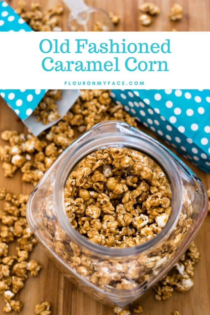 Old Fashioned Caramel Corn recipe in a glass jar and teal popcorn bags.