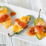 Stuffed Bacon Wrapped Jalapeno Pepper appetizer recipe that is so good you can't atop eating them.