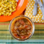 Homemade canned Roasted Pepper, Onion, Tomato and Peach salsa recipe in a mason jar