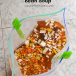 Freezer Meal Sausage Garbanzo Bean Soup recipe with crock pot and stove top cooking directions.