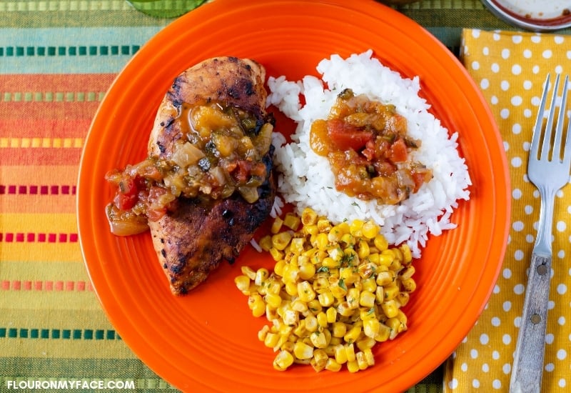 Grilled Chicken with white rice, corn and homemade Roasted Pepper Peach Salsa