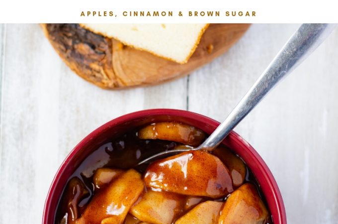 A brown bowl filled with Instant Pot Cinnamon Apples and a sliced pound cake on a wooden cutting board.