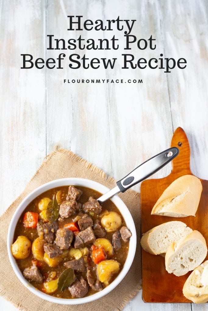 Hearty Instant Pot Beef Stew recipe served with crusty French bread to sop up the thick, delicious gravy