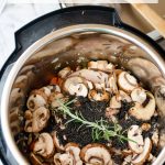 Instant Pot Chicken Wild Rice Soup recipe ingredients in the Instant Pot.