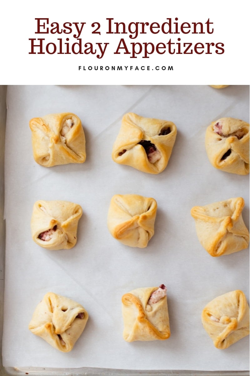 a baking tray of crescent roll appetizers for the holidays.
