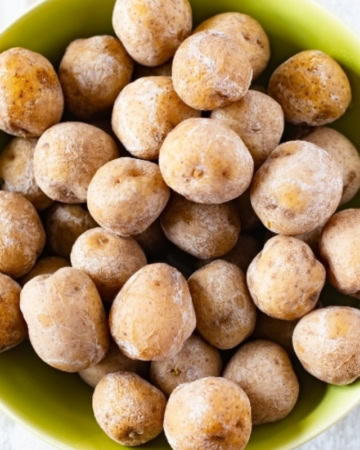 Creamy and tender cooked salt potatoes in a serving bowl.