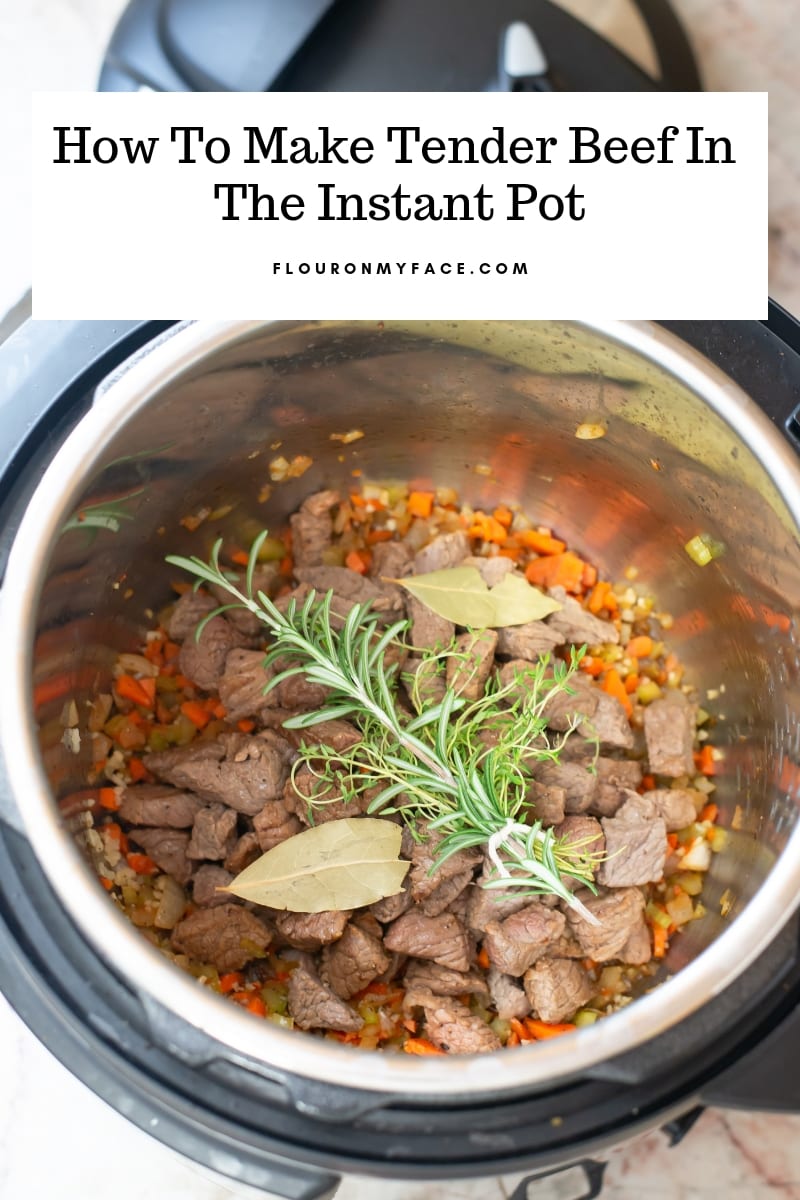 Instant Pot filled with the ingredients to make Beef Barley Soup