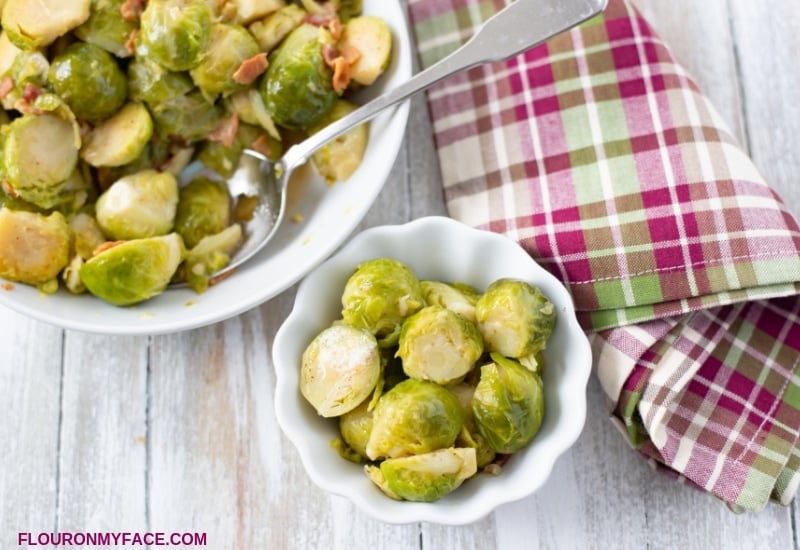 Individual servings of Instant Pot Brussels Sprouts for Thanksgiving dinner.