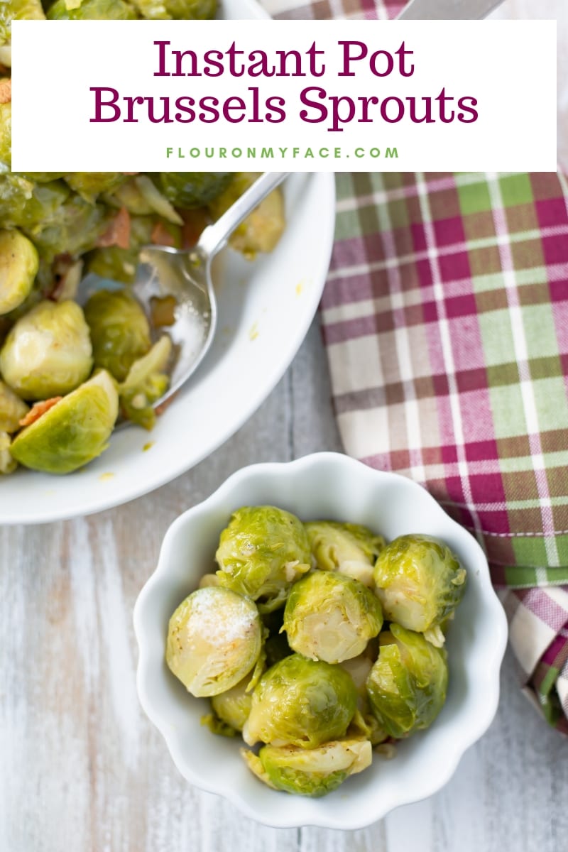A white serving bowl of pressure cooked Instant Pot Brussels Sprouts