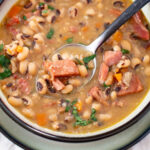 a bowl and spoon of Instant Pot Black-Eyed Peas recipe