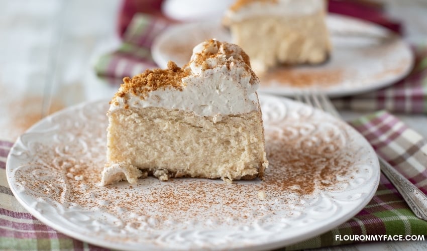 A slice of Instant Pot Eggnog Cheesecake on a dessert plate