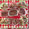 Saltine Cracker Toffee recipe in candy papers on a red, green and gold holiday serving plate.