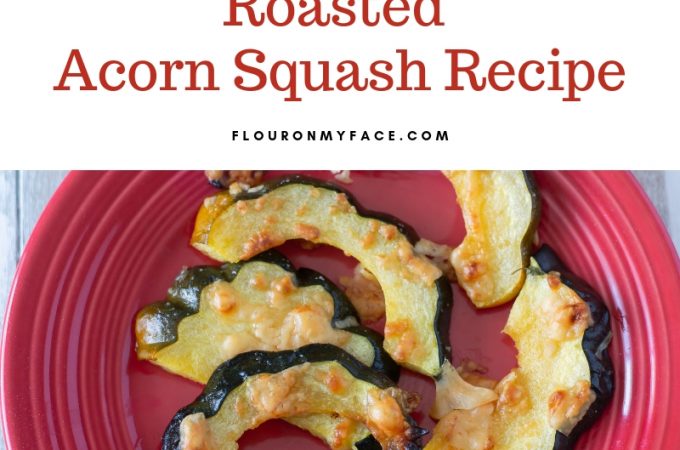 Roasted Acorn Squash slices on a red plate