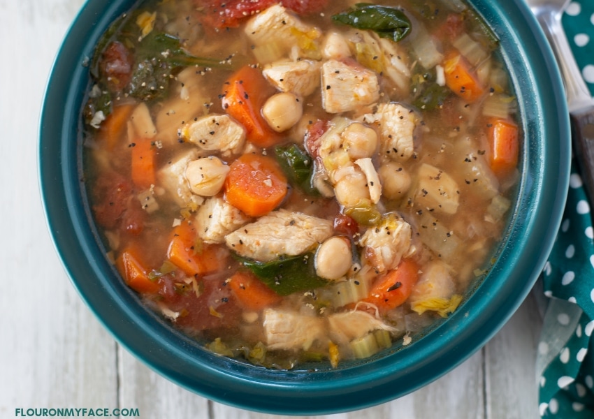 Close up photo of Crock Pot Chicken Garbanzo Bean Soup is a bowl