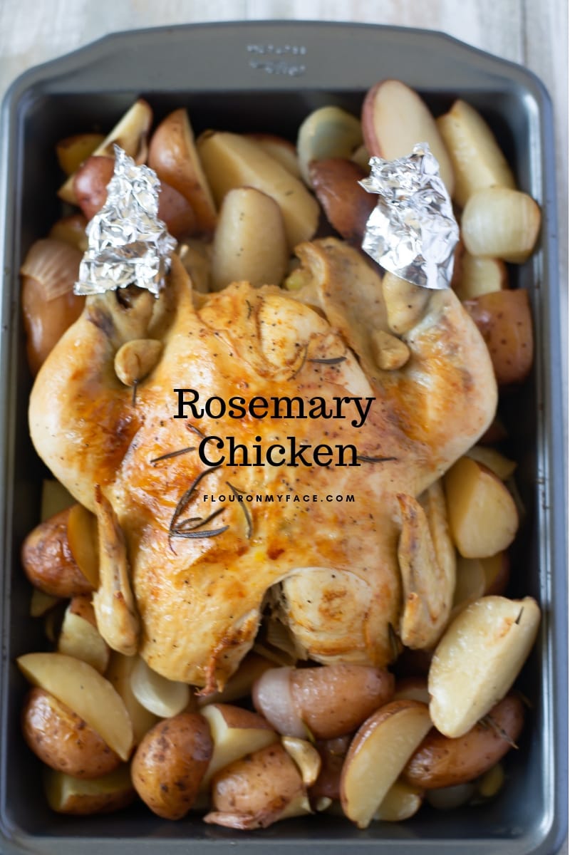 Whole Chicken cooked in the crock pot with fresh roasemary, potatoes, garlic and onion