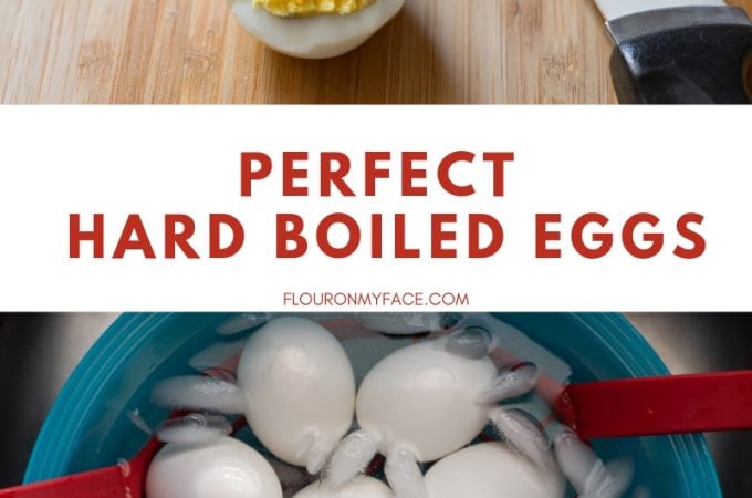 A Instant Pot hard boiled egg cut in half on a wooden cutting board with a bowl filled with ice water and the cooling hard boiled eggs.