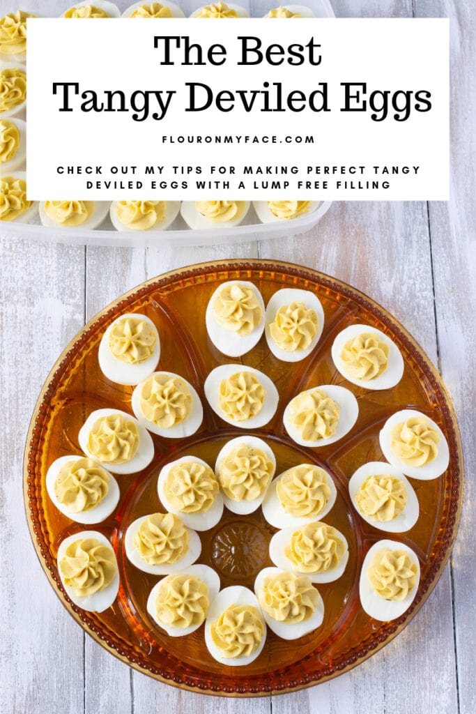 Holiday glass plate filled with Tangy Deviled Eggs