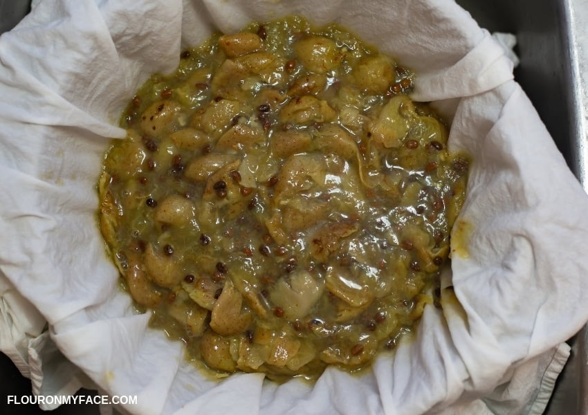 boiled grapes put in a jelly bag to drain the grape juice to make homemade grape jelly