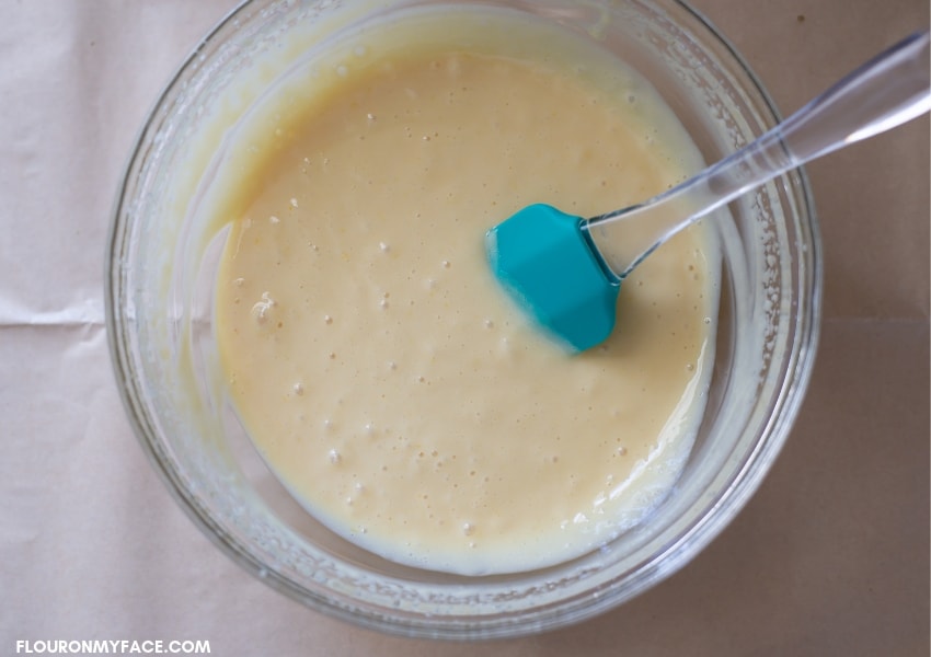 A mixing bowl full of authentic Key Lime Pie filling before filling a pie crust