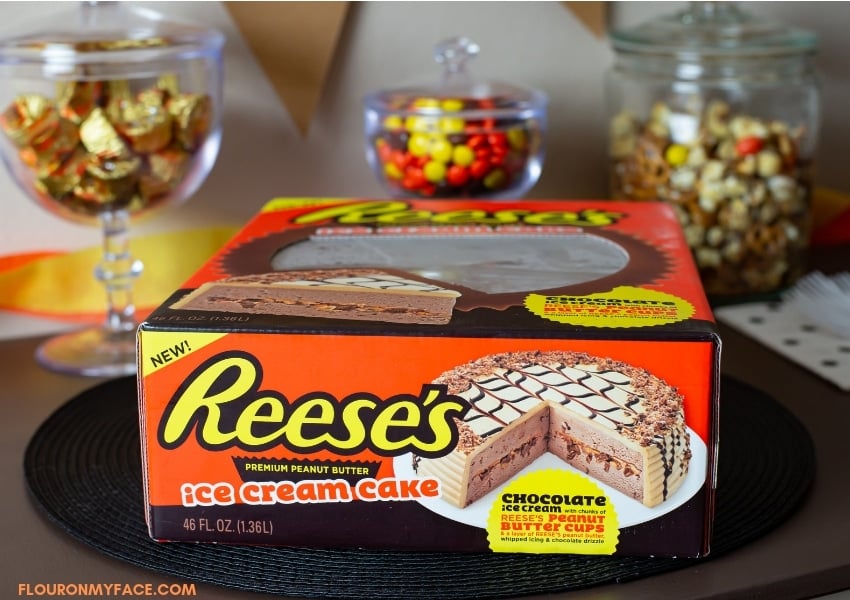 The new Reese’s Ice Cream Cake still in the box on a party table.